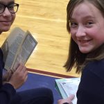 Two smiling female students